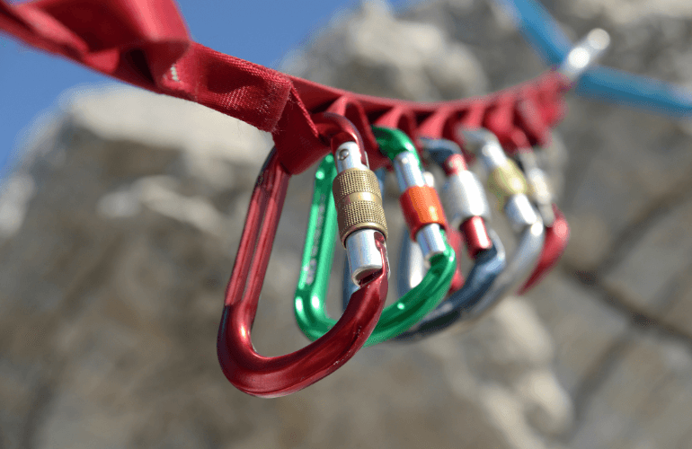 Different carabiners on a daisy chain