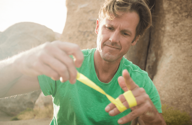 how to tape fingertips for climbing